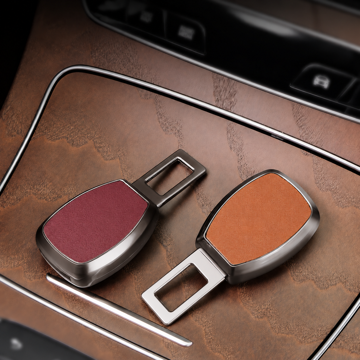 1 red and 1 orange seat belt alarm stopper in the car 1 red and 1 orange seat belt alarm stopper in the car